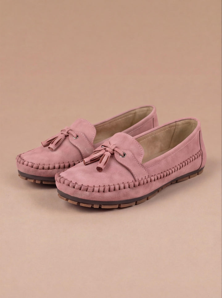 Plush women's moccasin loafers with tassels, providing ultimate comfort for all-day versatile style.