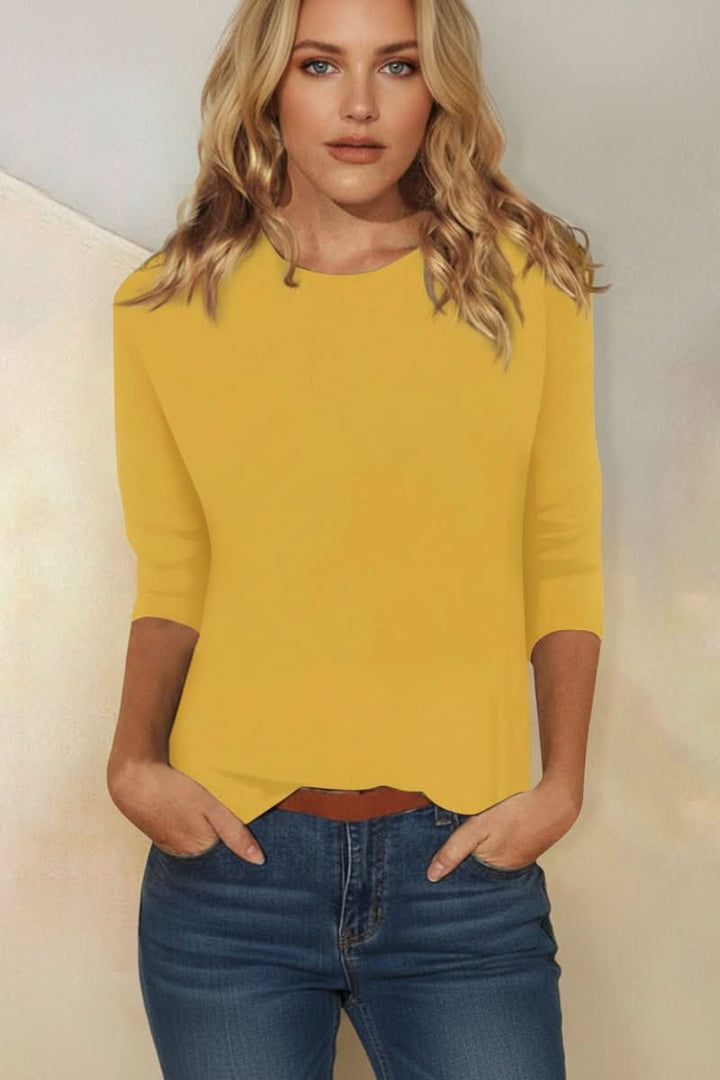 Versatile women's fashion blouse with 3/4 sleeves, chic and elegant for day to evening wear.