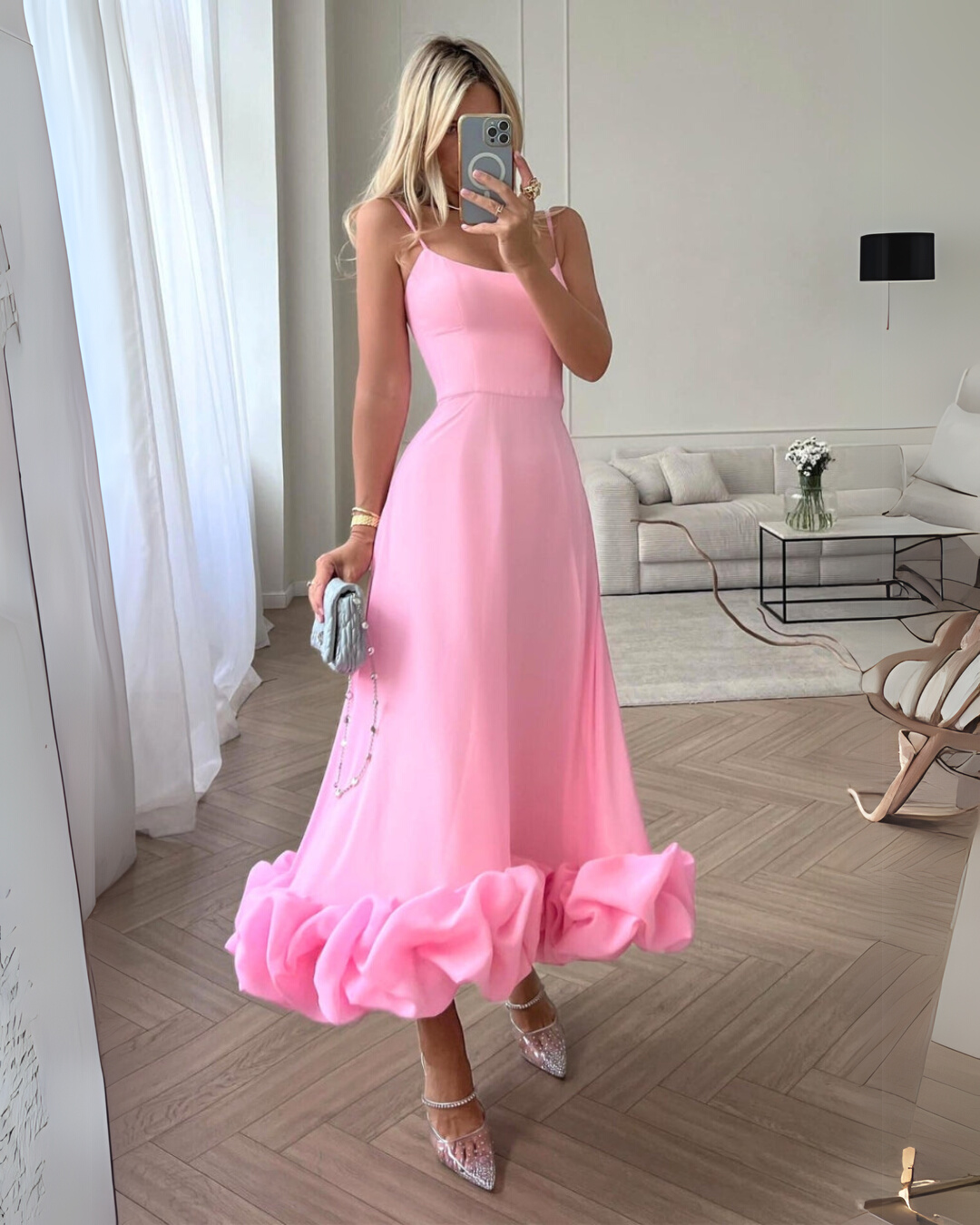 Women's chic twirl midi dress, perfect elegant wedding guest attire for a sophisticated look.