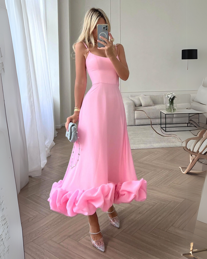 Women's chic twirl midi dress, perfect elegant wedding guest attire for a sophisticated look.