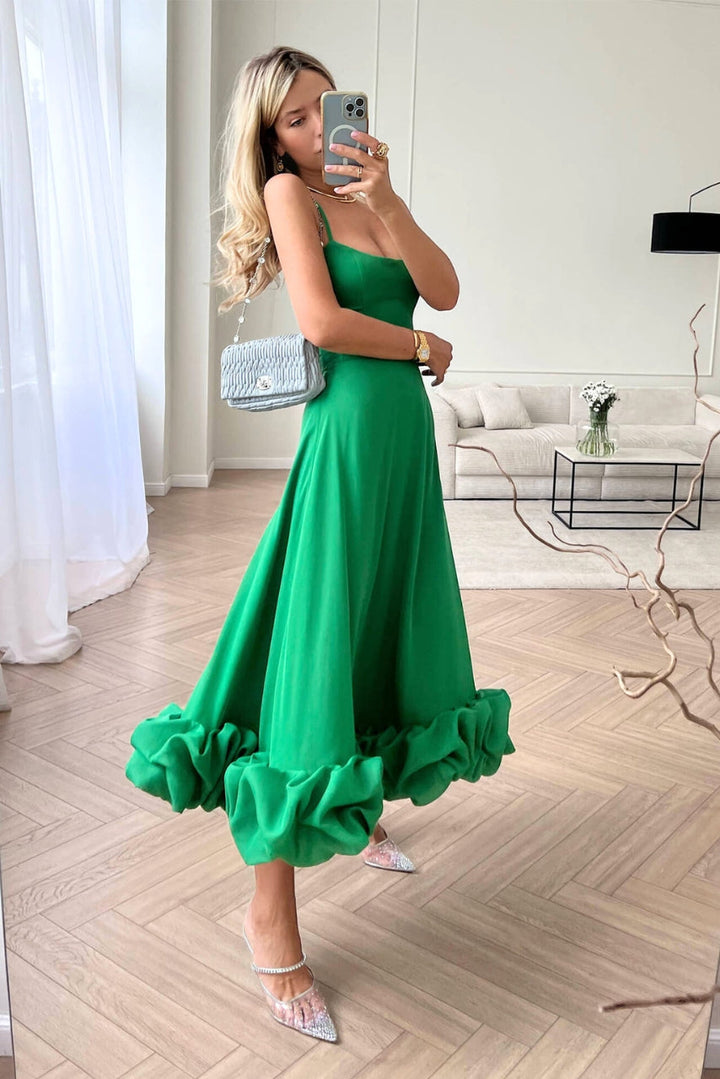 Chic twirl midi dress, a sophisticated women's wedding guest option for timeless style.