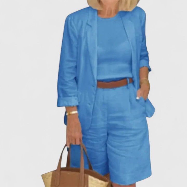 Trendy women's co-ord set with a stylish blazer & Bermuda shorts, embodying a relaxed yet tailored summer look.