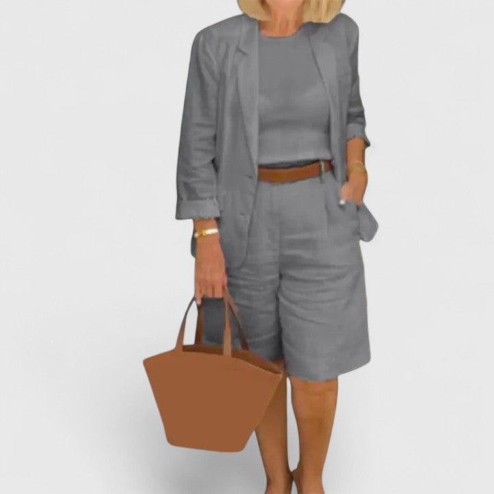 Tailored women's blazer and Bermuda shorts co-ord set, offering a modern and chic summer fashion statement.