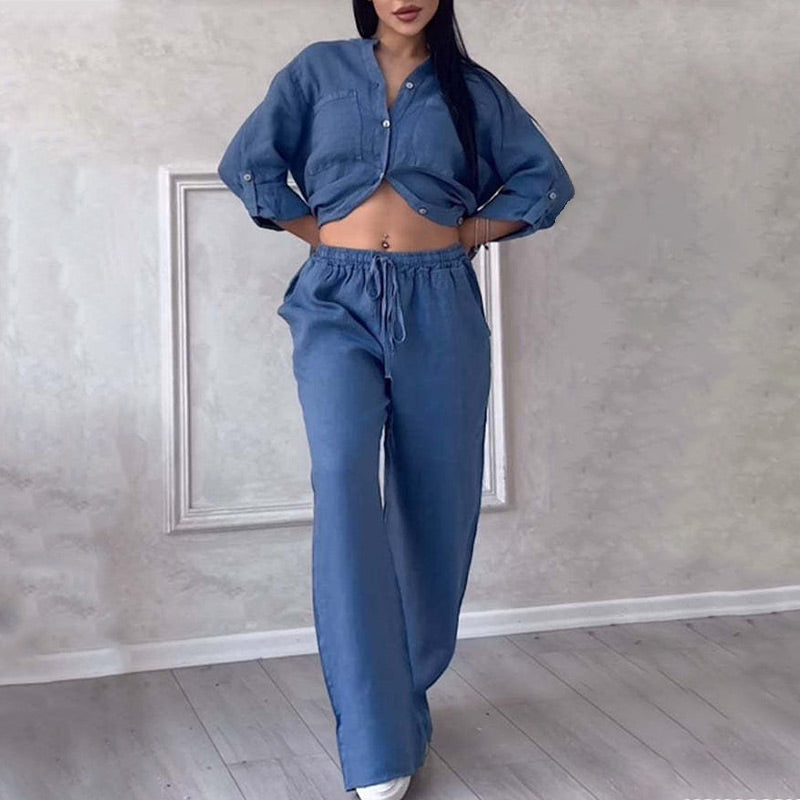 Stylish women's matching set: relaxed fit button-down shirt paired with comfortable wide-leg pants. Ideal for travel.