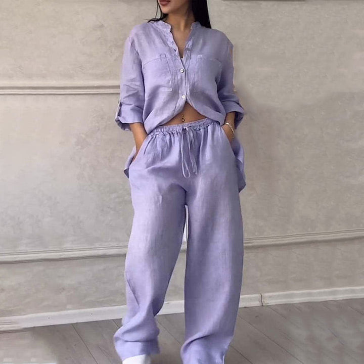 Women's summer two-piece outfit. Casual matching set with relaxed button-down shirt & comfortable wide-leg pants.