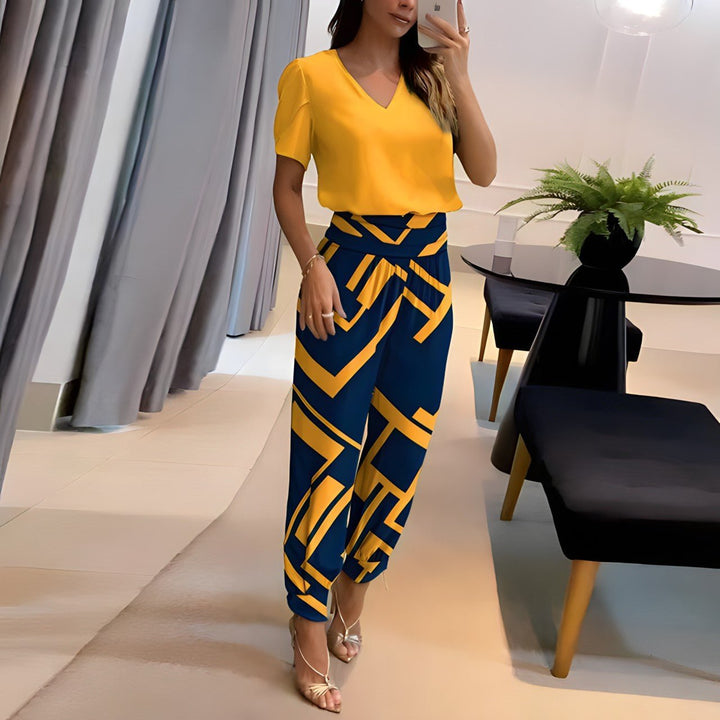 Women's chic two-piece set with puff sleeves and comfortable wide-leg pants. Perfect for everyday or loungewear.
