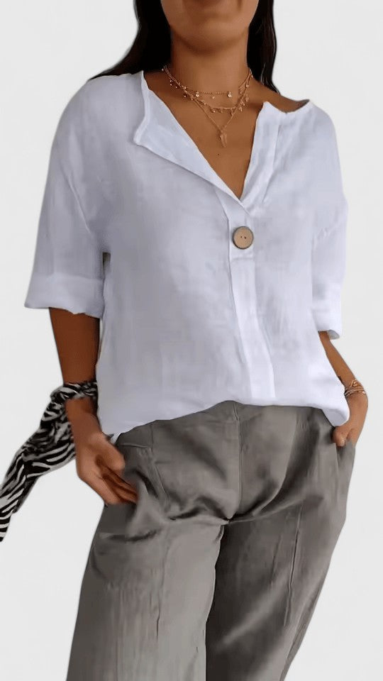 Elegant women's V-neck blouse with a front knot detail. Chic & versatile summer top for effortless style.