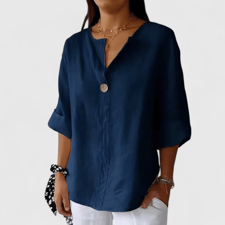 Fashionable women's V-neck top with a stylish front knot. Effortless chic summer blouse, versatile for any occasion.