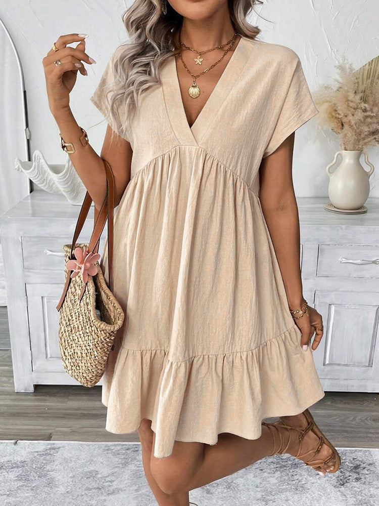Elegant women's sleeveless V-neck mini dress, designed for summer with a pretty ruffle hem, versatile for day or night.