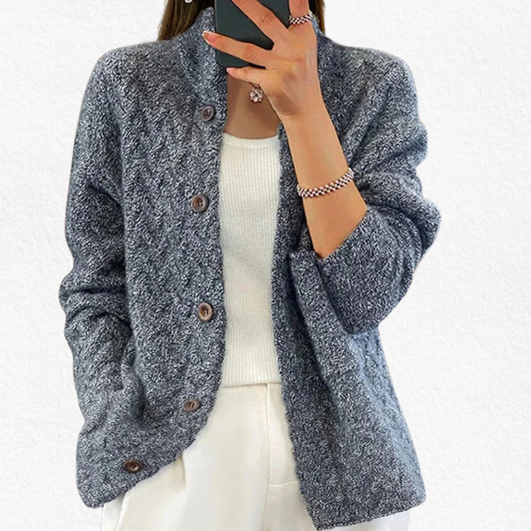 Stylish women's long sleeve button cardigan featuring a chunky cable knit design for a cozy, relaxed fall fashion look.