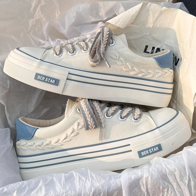 Elevated style women's platform shoes, chunky sneakers with lace-up design for modern fashion footwear.