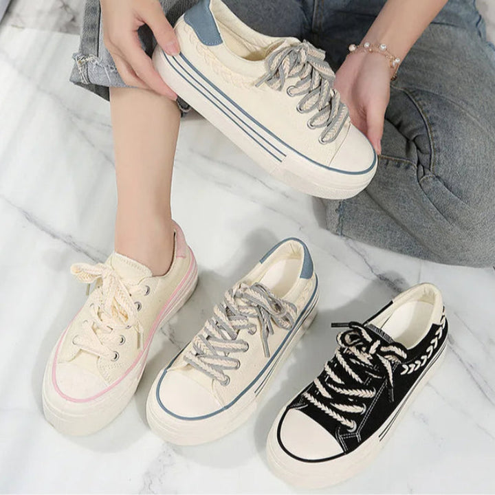 White women's chunky platform sneakers, new fashion footwear designed for comfortable elevated style.