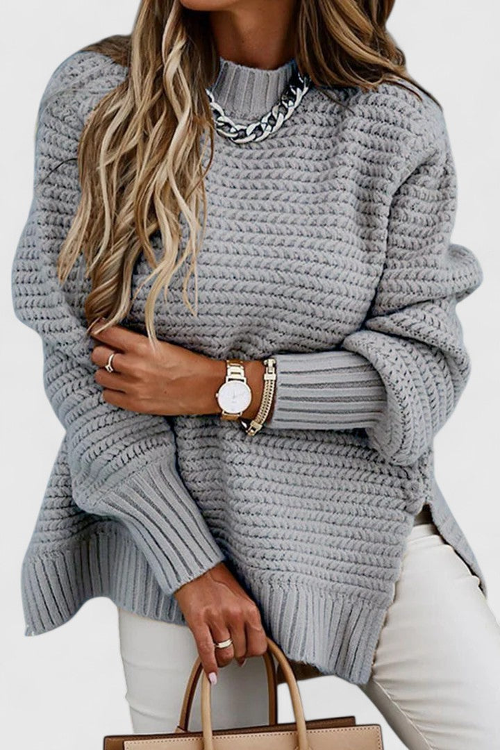 Stylish women's mock neck sweater in a chunky ribbed knit. Oversized for comfort and winter warmth.