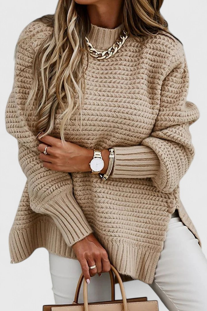 Relaxed fit women's chunky ribbed pullover sweater. A warm, fashionable mock neck top for casual wear.