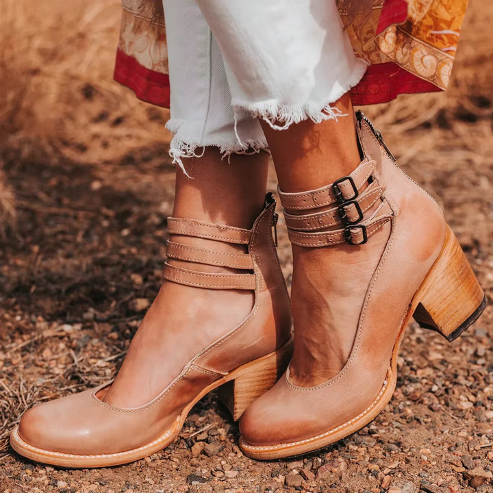 Modern women's block heel pumps, round toe, and adjustable ankle strap. Blending style with comfort.
