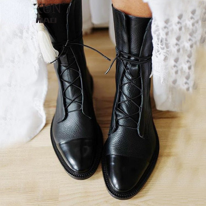 Classic black lace-up ankle boots for women, perfect for fall fashion, durable and stylish.