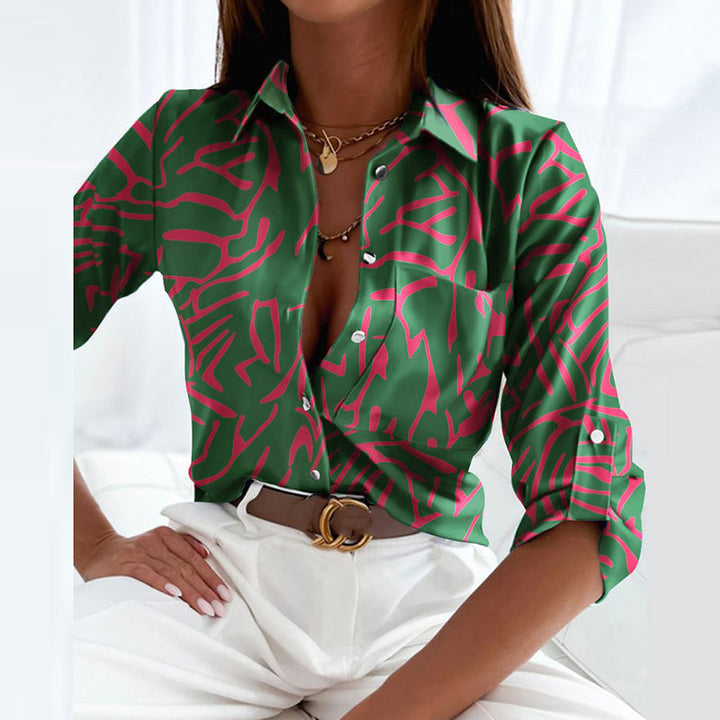 Classic women's office wear blouse, featuring a stylish collar and long sleeves for a polished, professional look.