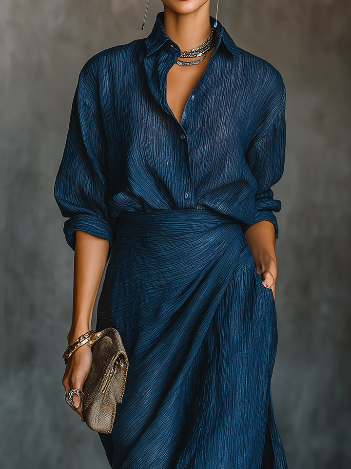 Versatile women's dark blue two-piece set: elegant long skirt & classic collared shirt for any occasion.