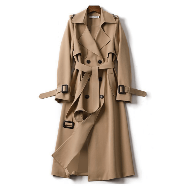 Women's elegant classic trench coat. Double-breasted design, tie-waist, long length. Ideal women's outerwear.
