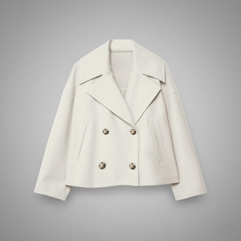 Cropped women's jacket with prominent double buttons, perfect for a chic and classic look.