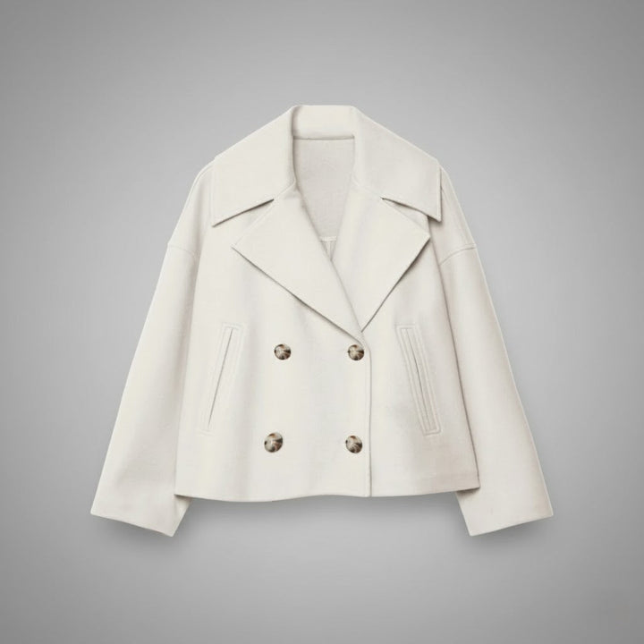 Cropped women's jacket with prominent double buttons, perfect for a chic and classic look.