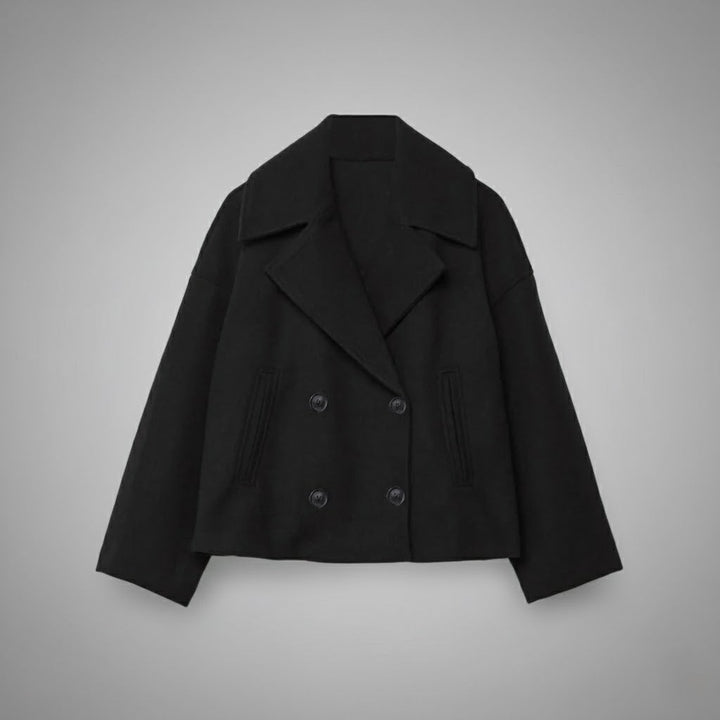 Fashionable women's short jacket, double-breasted with classic buttons for an elegant touch.