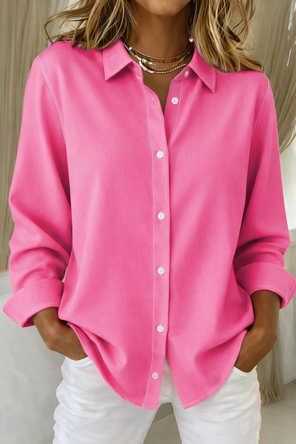 Women's classic long sleeve button-up shirt in a relaxed fit, perfect for everyday casual wear.
