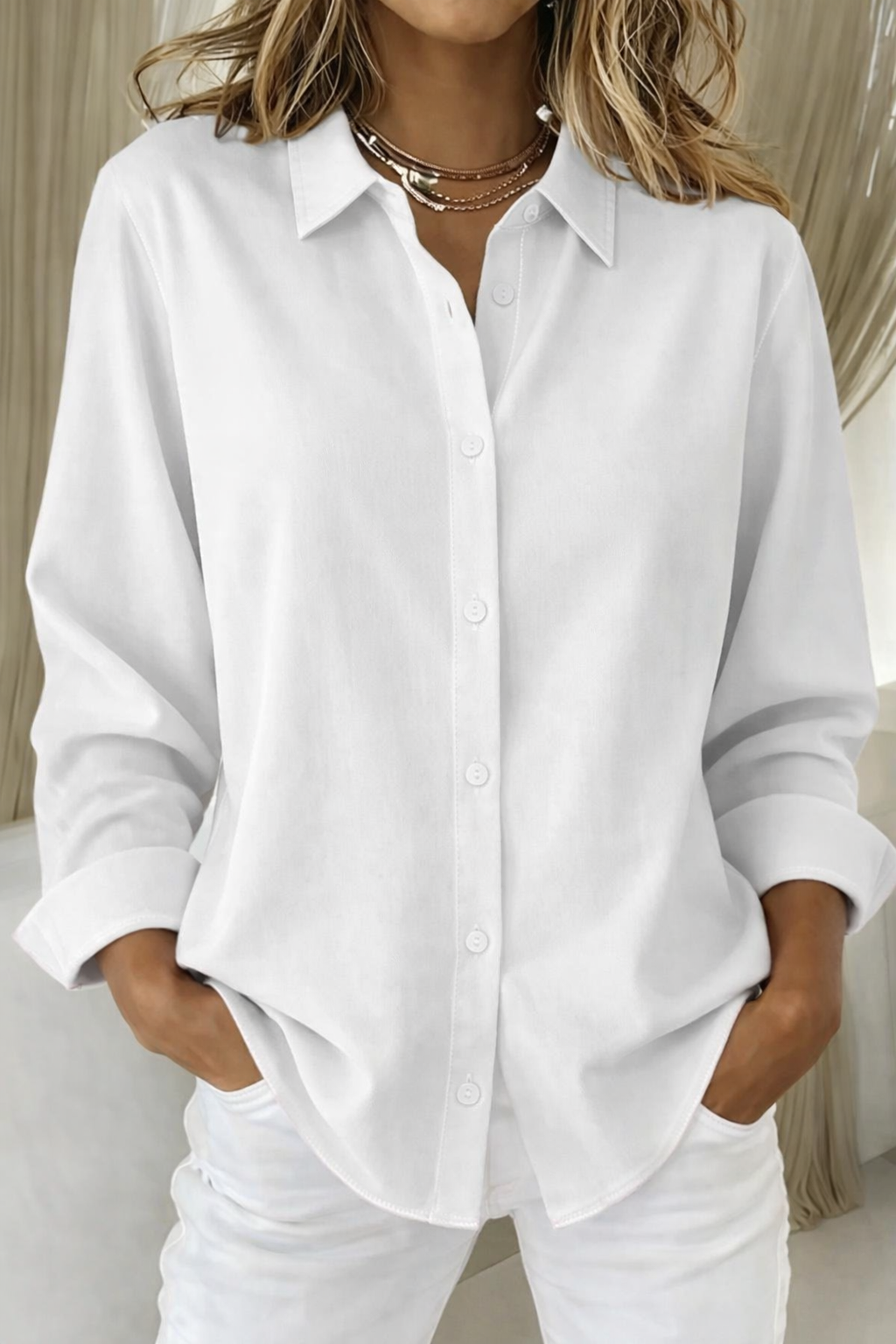Classic women's long sleeve blouse. Relaxed fit button-up shirt for versatile office and casual styling.