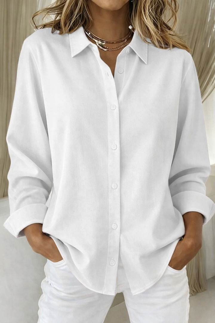 Classic women's long sleeve blouse. Relaxed fit button-up shirt for versatile office and casual styling.