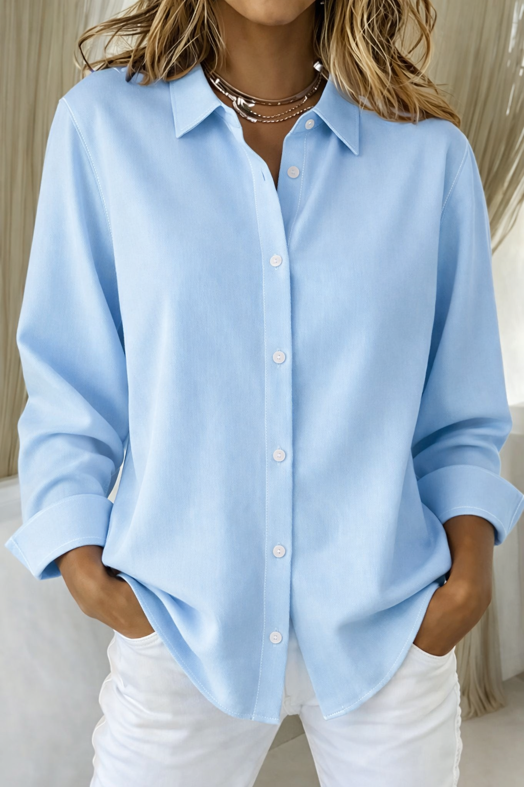 Comfortable women's long sleeve button-up shirt, classic style, relaxed fit for everyday comfort.