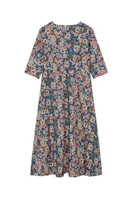 Ivory classic midi dress for women with elegant button detail. Versatile for day-to-night; relaxed & comfortable fit.