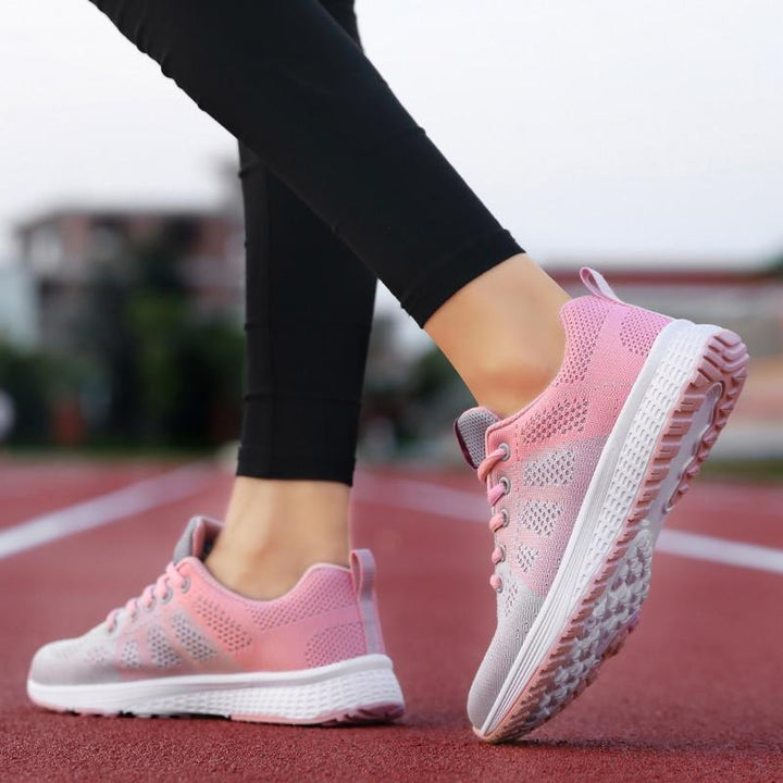Angled shot of women's classic orthopedic walking shoes, showcasing their comfortable design.