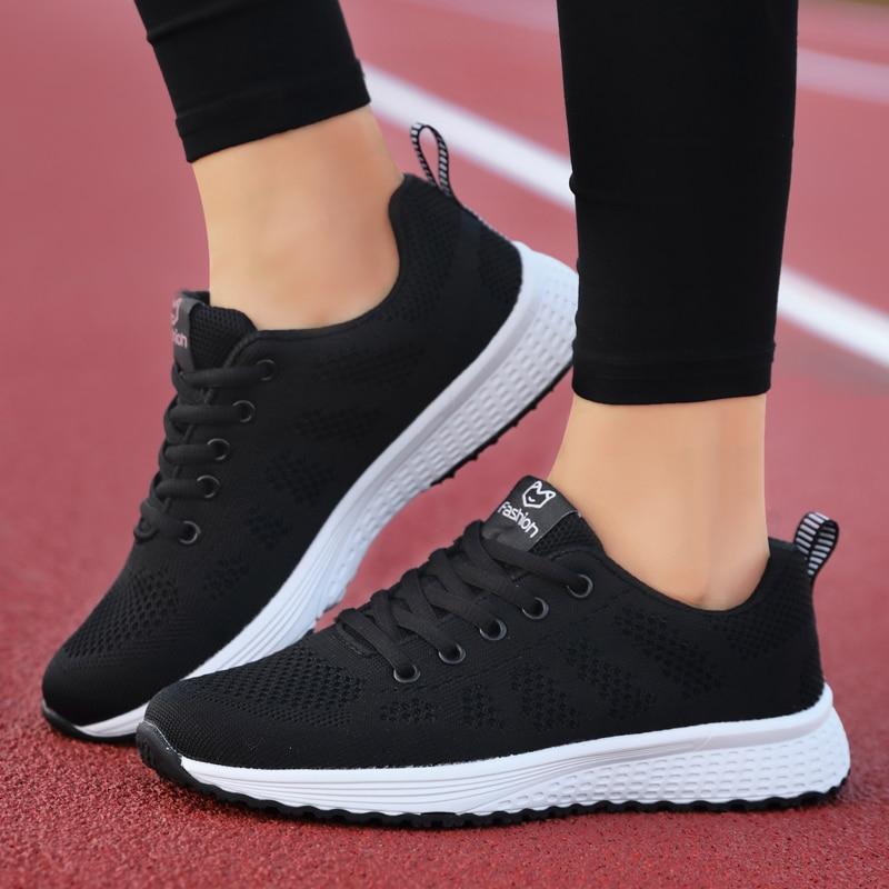 Orthopedic walking shoes for women, black, featuring a lace-up design for adjustable support.
