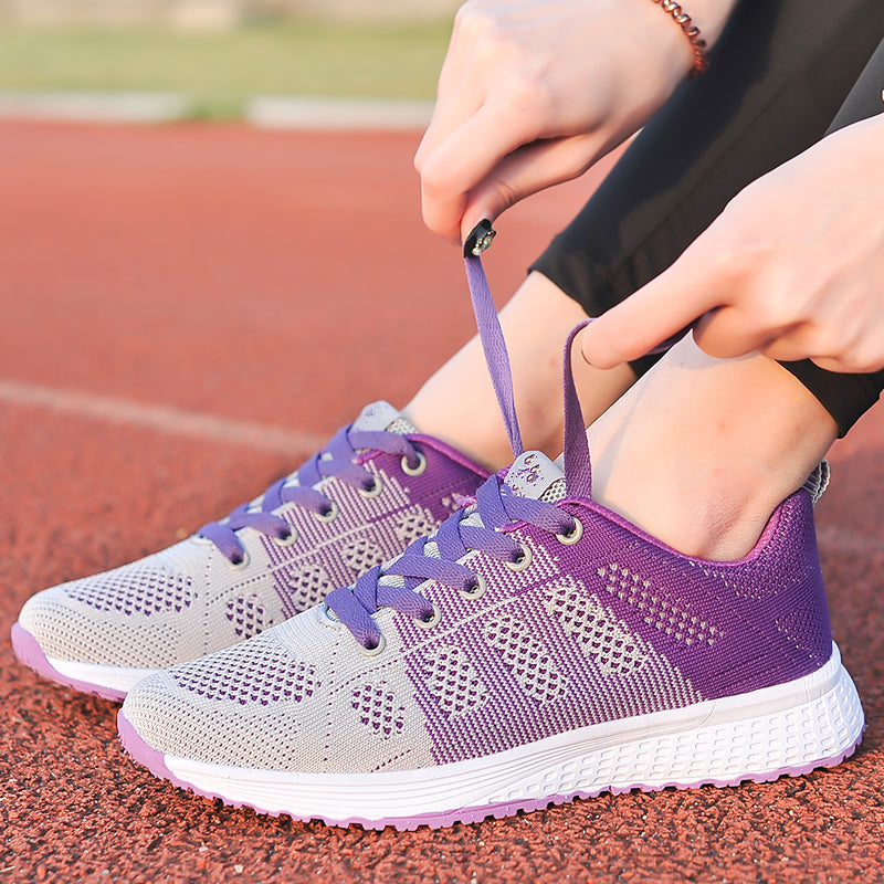 Side view of women's comfortable walking shoes with arch support, designed for pain relief.