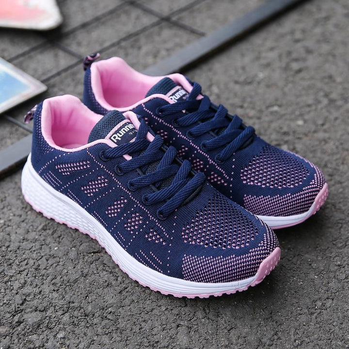 Women's classic walking shoes, light blue, offering arch support and cushioned comfort.