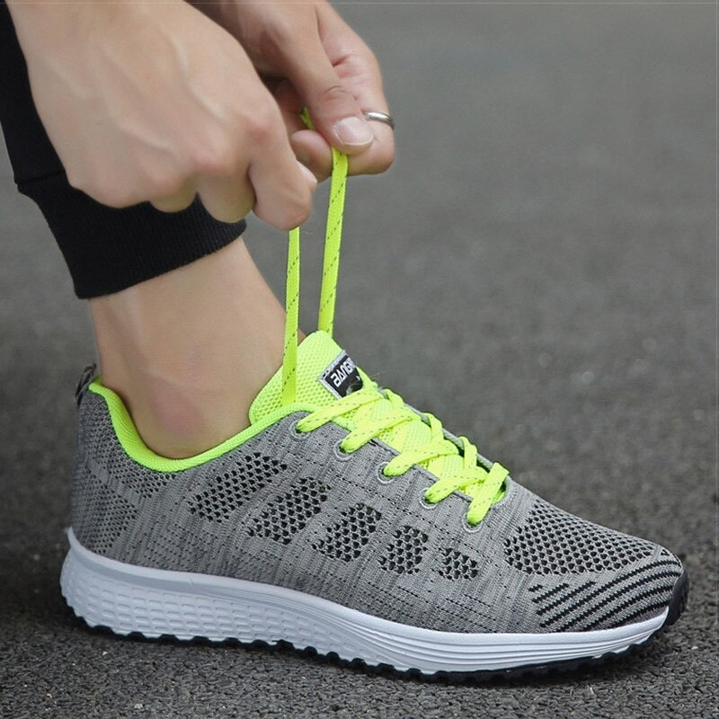 Angled view of women's orthopedic shoes, highlighting arch support technology for comfort.