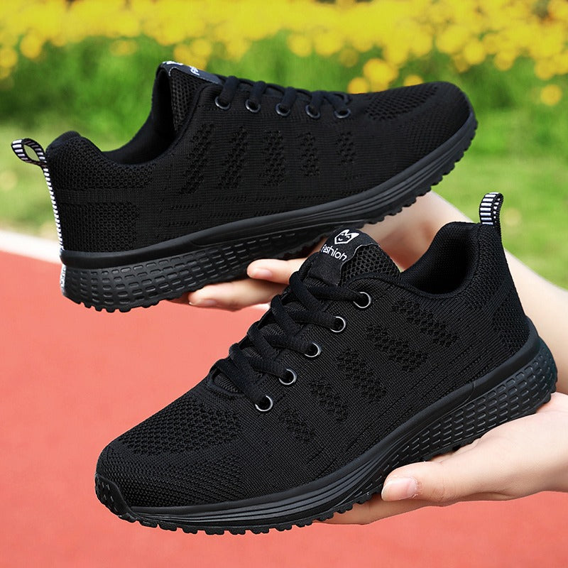 Non-slip sole of women's orthopedic walking shoes, close-up, for reliable traction.