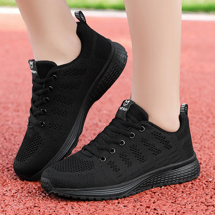 Women's support shoes, black, designed for active everyday wear and lasting comfort.