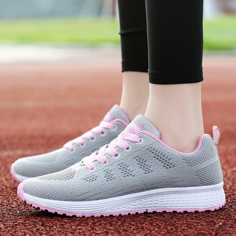 Front view of classic lace-up women's walking shoes, offering support and comfort for daily walks.