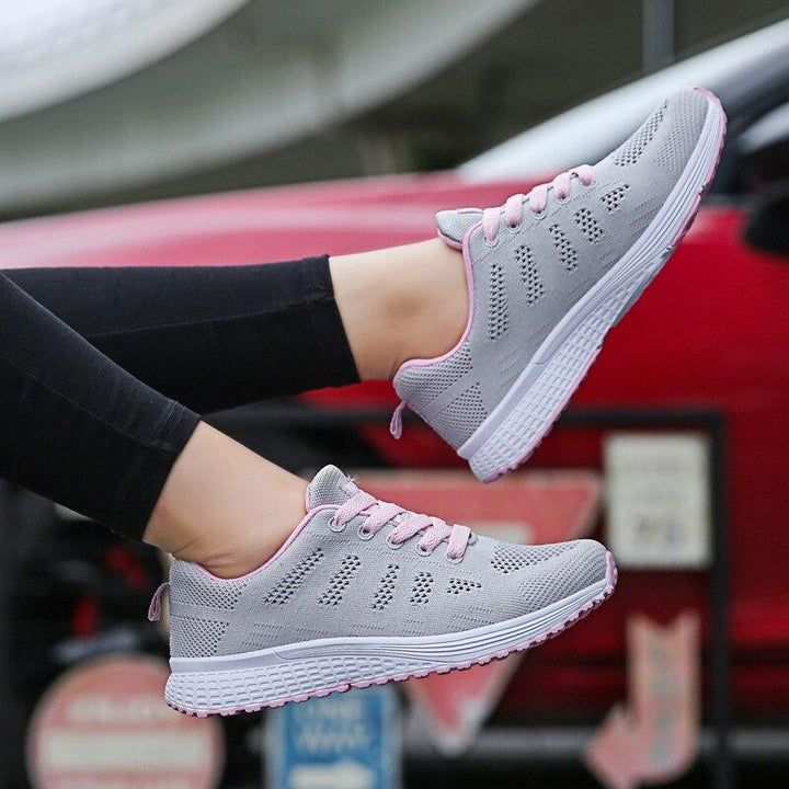Pair of women's comfortable support shoes, black, perfect for everyday walking and pain relief.