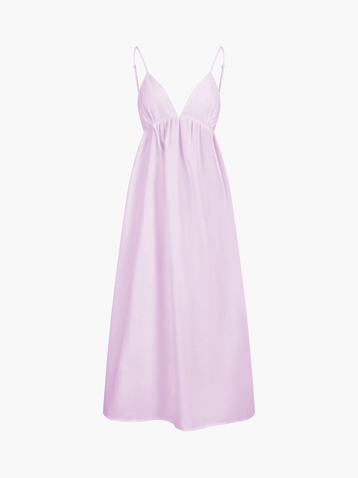 Flowing Coastal Cowgirl open back maxi dress. Women's summer casual & vacation style, V-neck design.