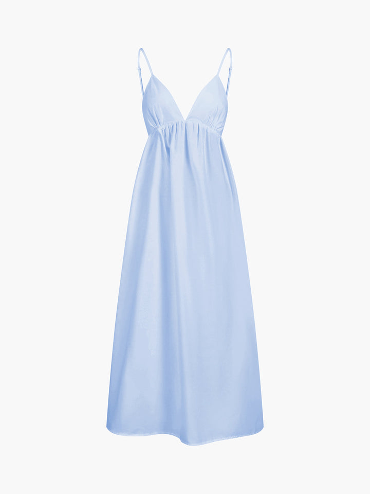 Women's summer maxi dress with open back & V-neck. Sleeveless, elegant, flowing for beach or vacation.