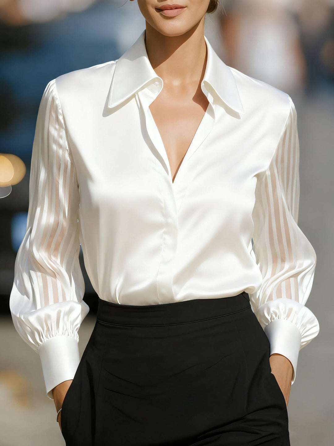 Sophisticated women's sheer sleeve button-up blouse. Ideal for office fashion & versatile styling.