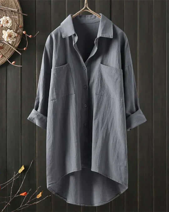 Casual women's longline blouse with roll-tab sleeves & double pockets. Comfortable oversized shirt, great for everyday.