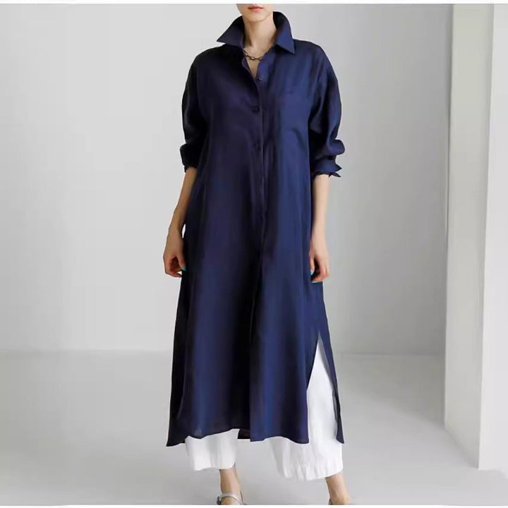 Casual women's longline shirt dress with a collar, roll-up sleeves, and button-front design.