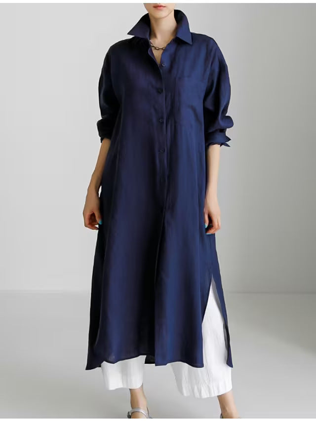 Chic women's collared longline midi shirt dress, designed with comfortable roll-up sleeves.