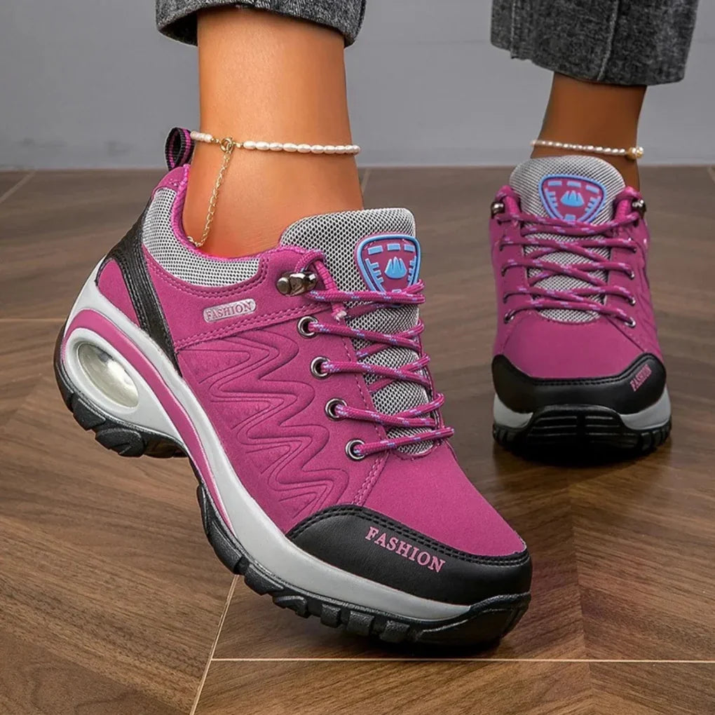 Vibrant women's water-resistant hiking shoes with anti-slip grip for comfortable & secure outdoor trail adventures.