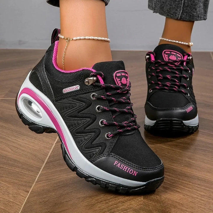 Stylish women's colorful water-resistant hiking shoes, offering comfort & support for any outdoor trail adventure.