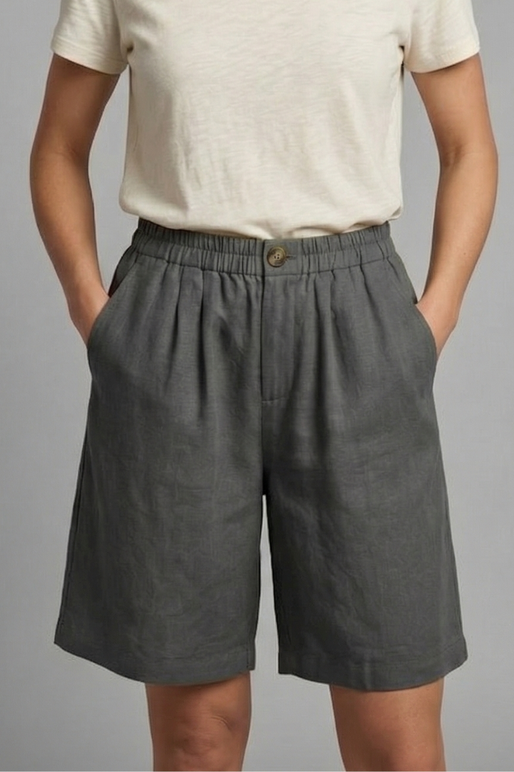 Loose fit women's shorts with elastic drawstring waist, perfect for summer activities & comfort.