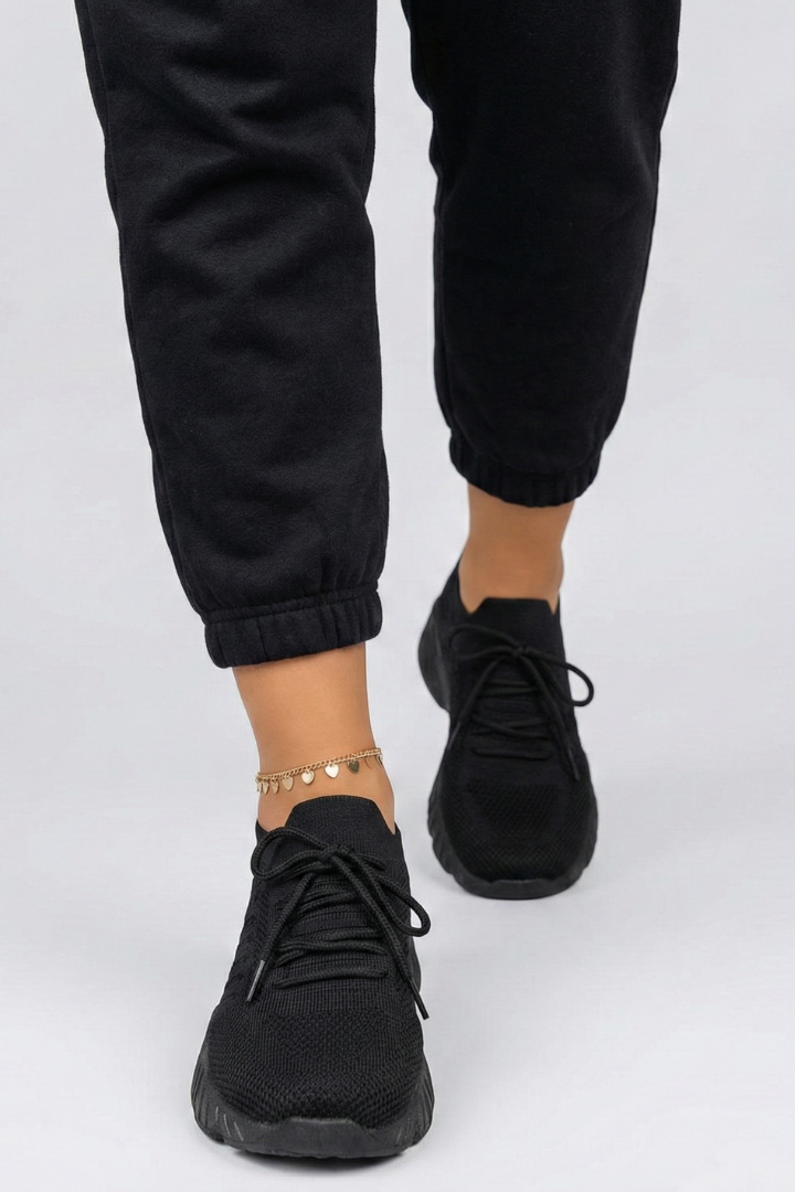 Soft knit women's sneakers offering ultimate comfort & secure laces, perfect for daily casual wear.